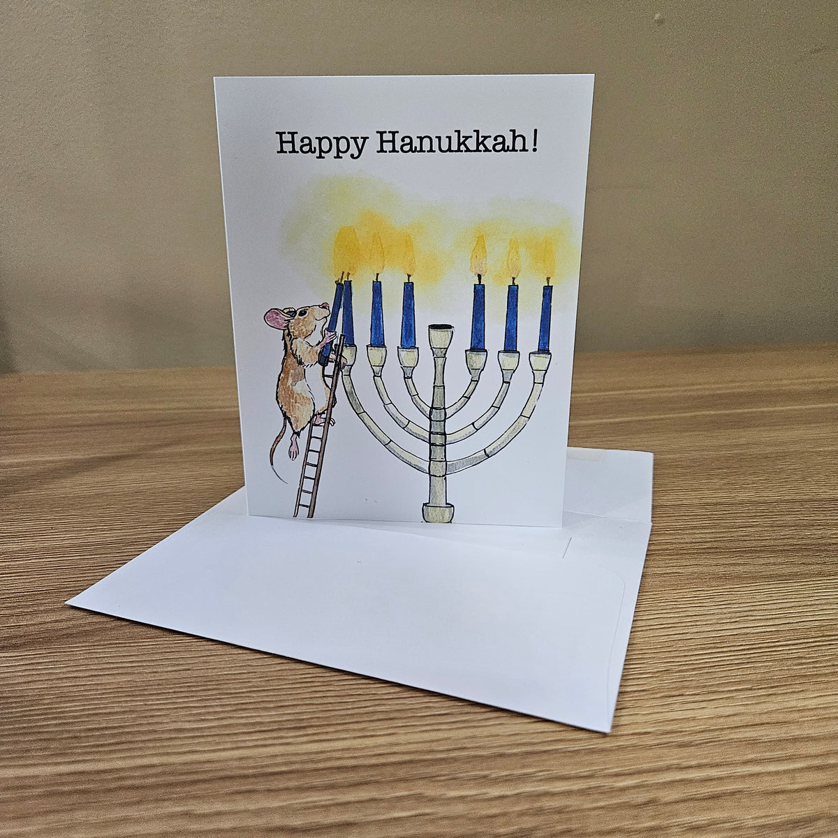 Hanukkah Greeting Card – Lamplighter Mouse Lighting the Menorah | 4.25 x 5.5 Inches