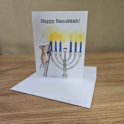 Hanukkah Greeting Card – Lamplighter Mouse Lighting the Menorah | 4.25 x 5.5 Inches