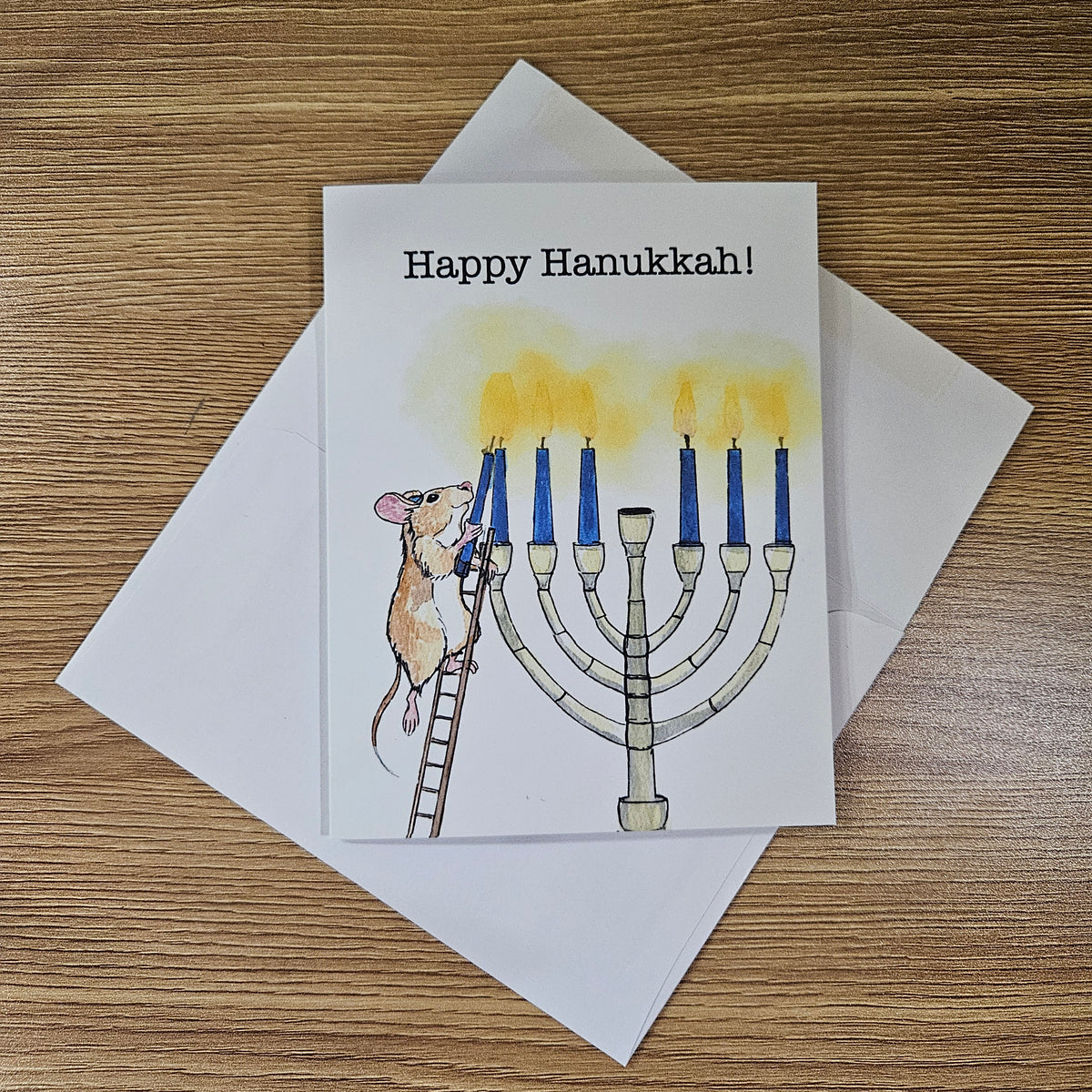Hanukkah Greeting Card – Lamplighter Mouse Lighting the Menorah | 4.25 x 5.5 Inches
